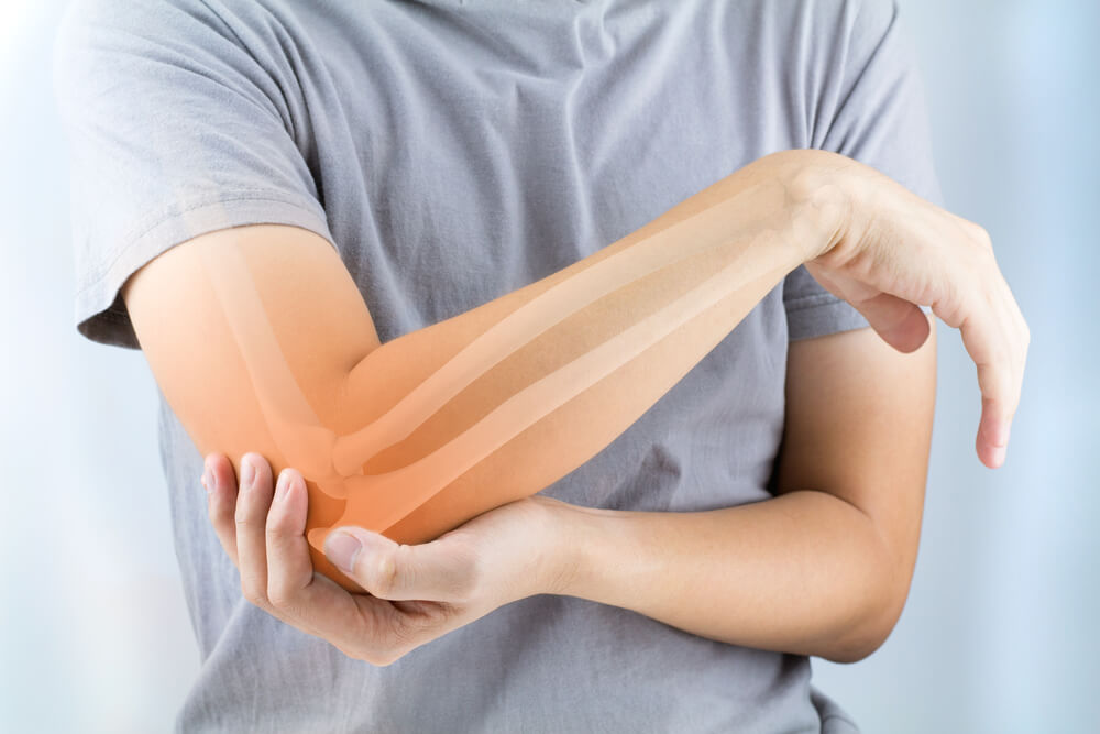 Athlete stretching while recovering from a sports injury